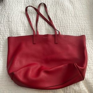 Much loves YSL YVES St Laurent large tote.